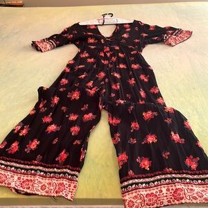 Size L black jumpsuit with flowers